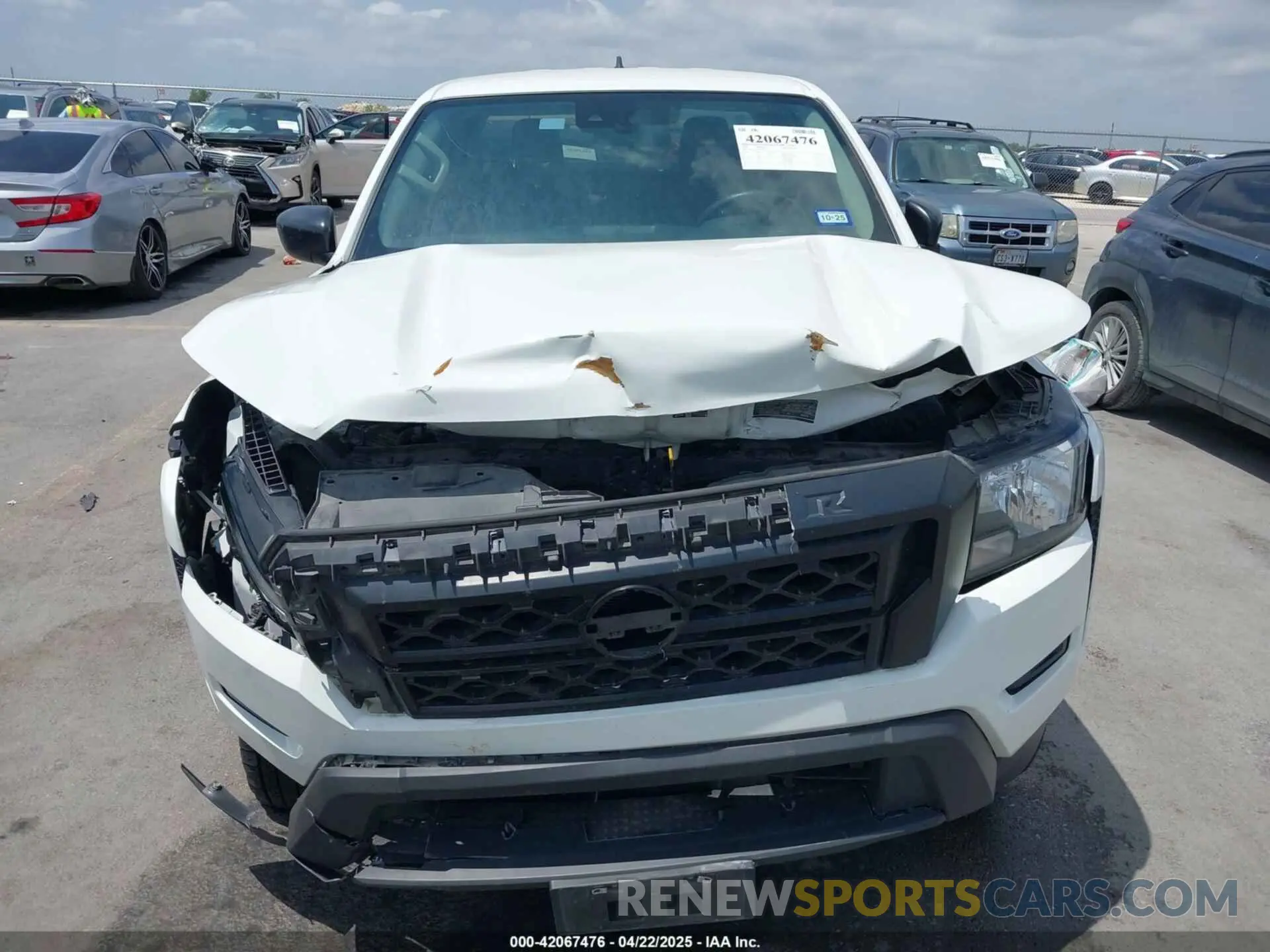 12 Photograph of a damaged car 1N6ED1EJ1PN624532 NISSAN FRONTIER 2023