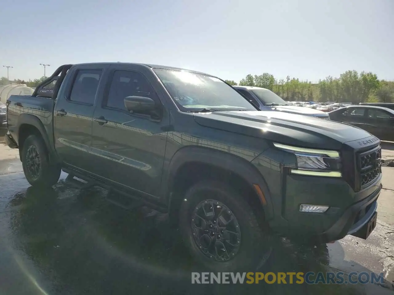4 Photograph of a damaged car 1N6ED1EK3PN622340 NISSAN FRONTIER 2023