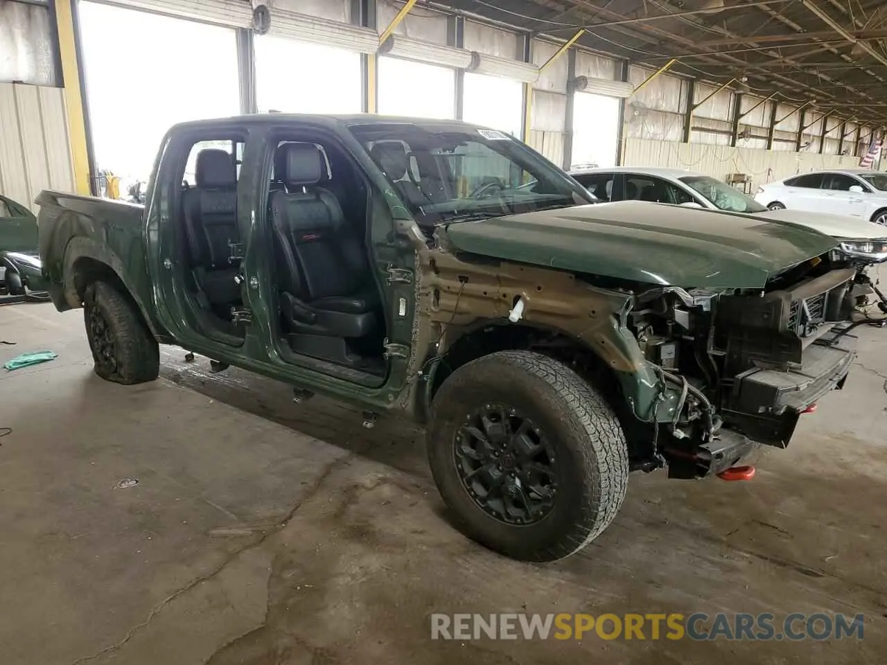 4 Photograph of a damaged car 1N6ED1EK4PN671708 NISSAN FRONTIER 2023