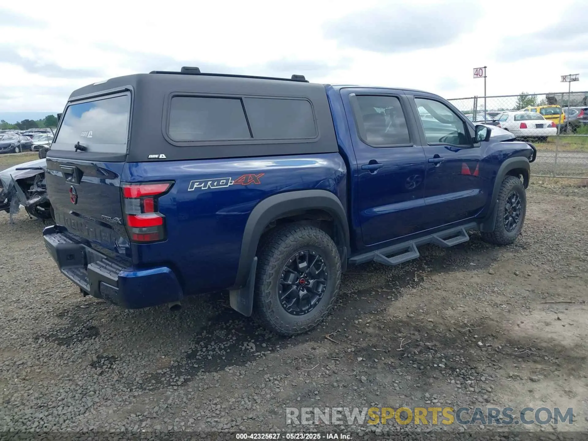 4 Photograph of a damaged car 1N6ED1EKXPN603865 NISSAN FRONTIER 2023