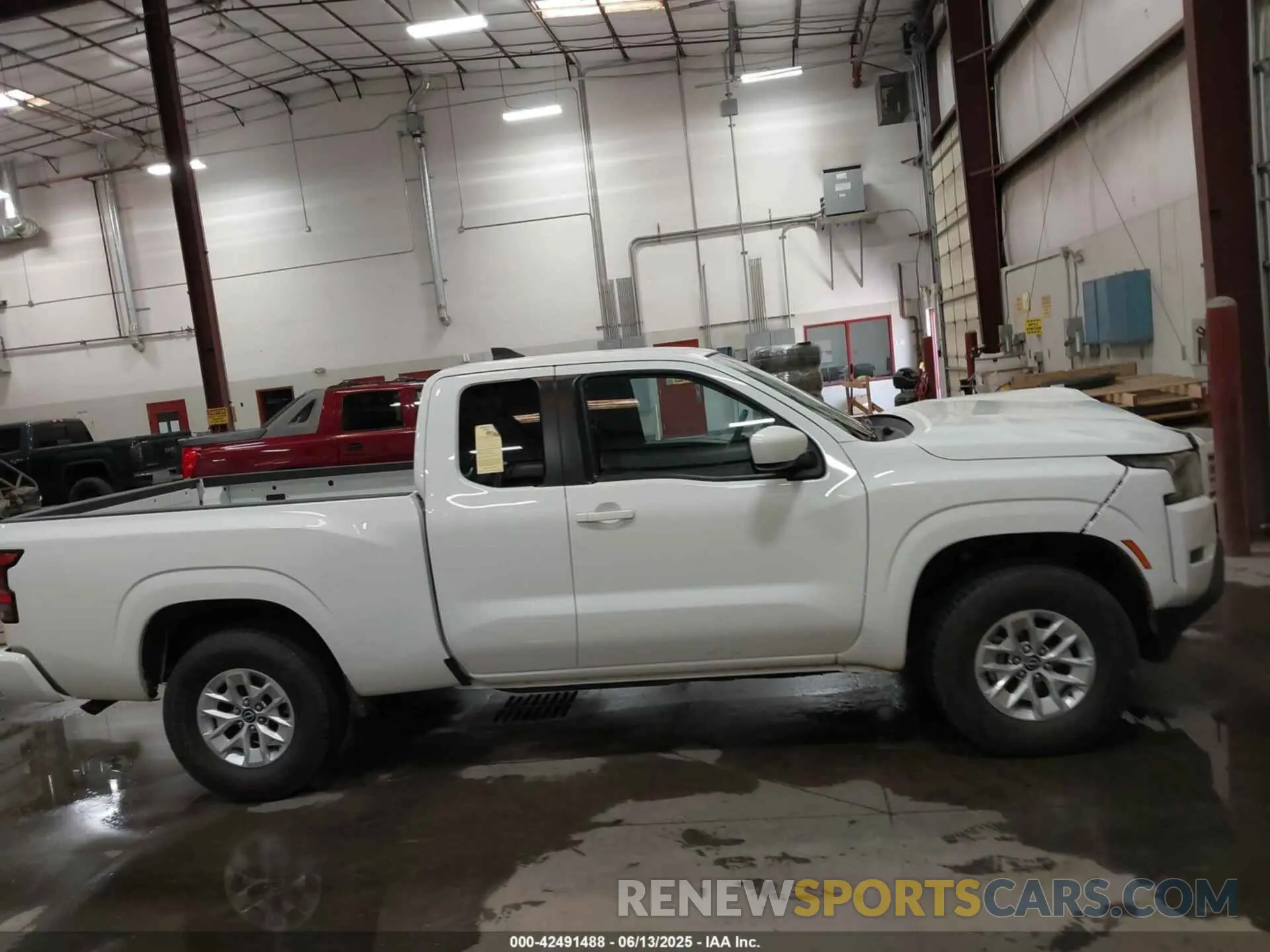 14 Photograph of a damaged car 1N6ED1CM3RN671481 NISSAN FRONTIER 2024