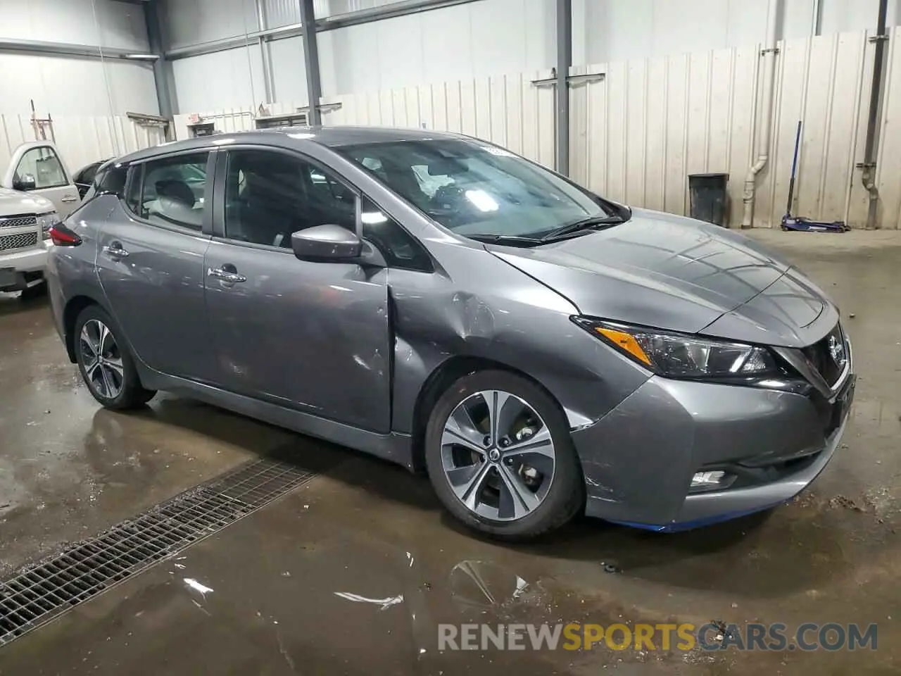 4 Photograph of a damaged car 1N4BZ1CPXLC310937 NISSAN LEAF 2020