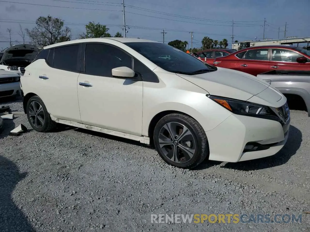 4 Photograph of a damaged car 1N4AZ1CV5NC551415 NISSAN LEAF 2022