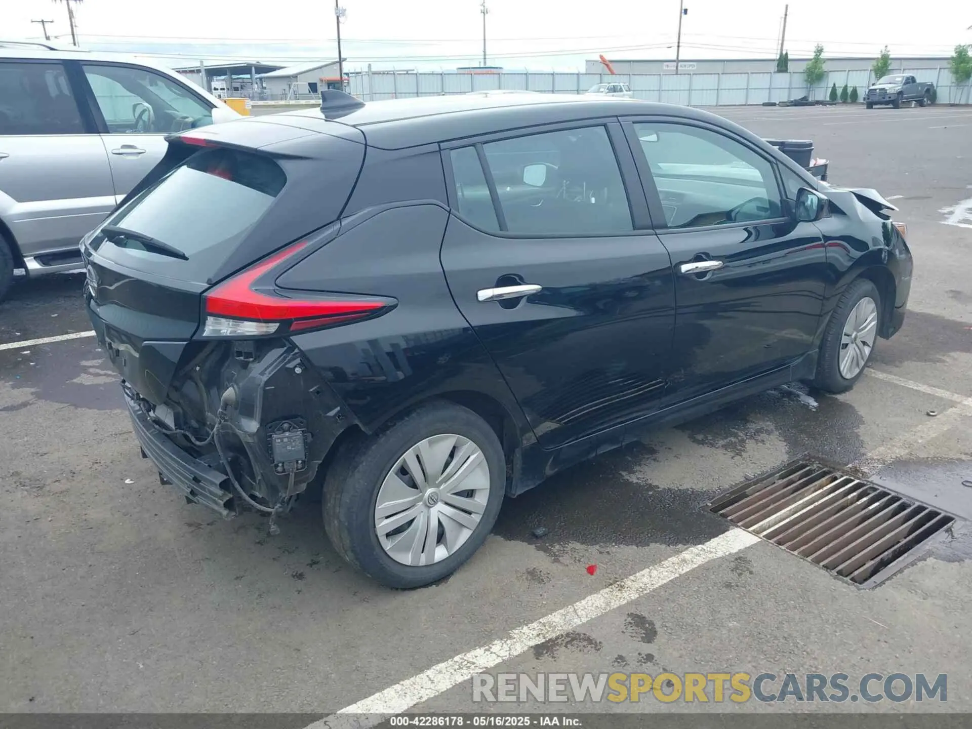 4 Photograph of a damaged car 1N4AZ1BV7PC557687 NISSAN LEAF 2023
