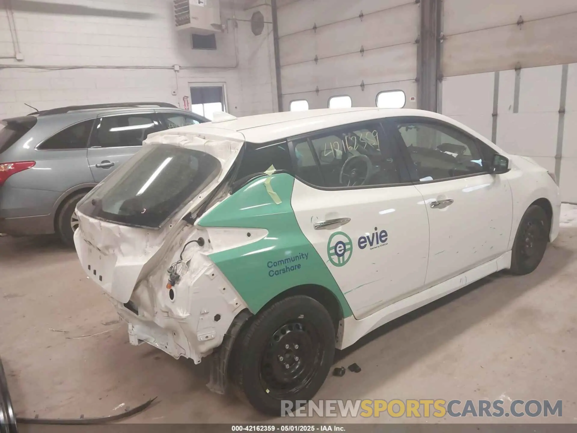 4 Photograph of a damaged car 1N4AZ1BV8PC559724 NISSAN LEAF 2023