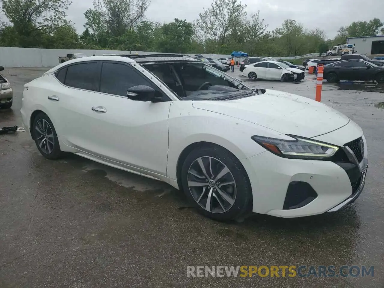 4 Photograph of a damaged car 1N4AA6AV0KC371116 NISSAN MAXIMA 2019