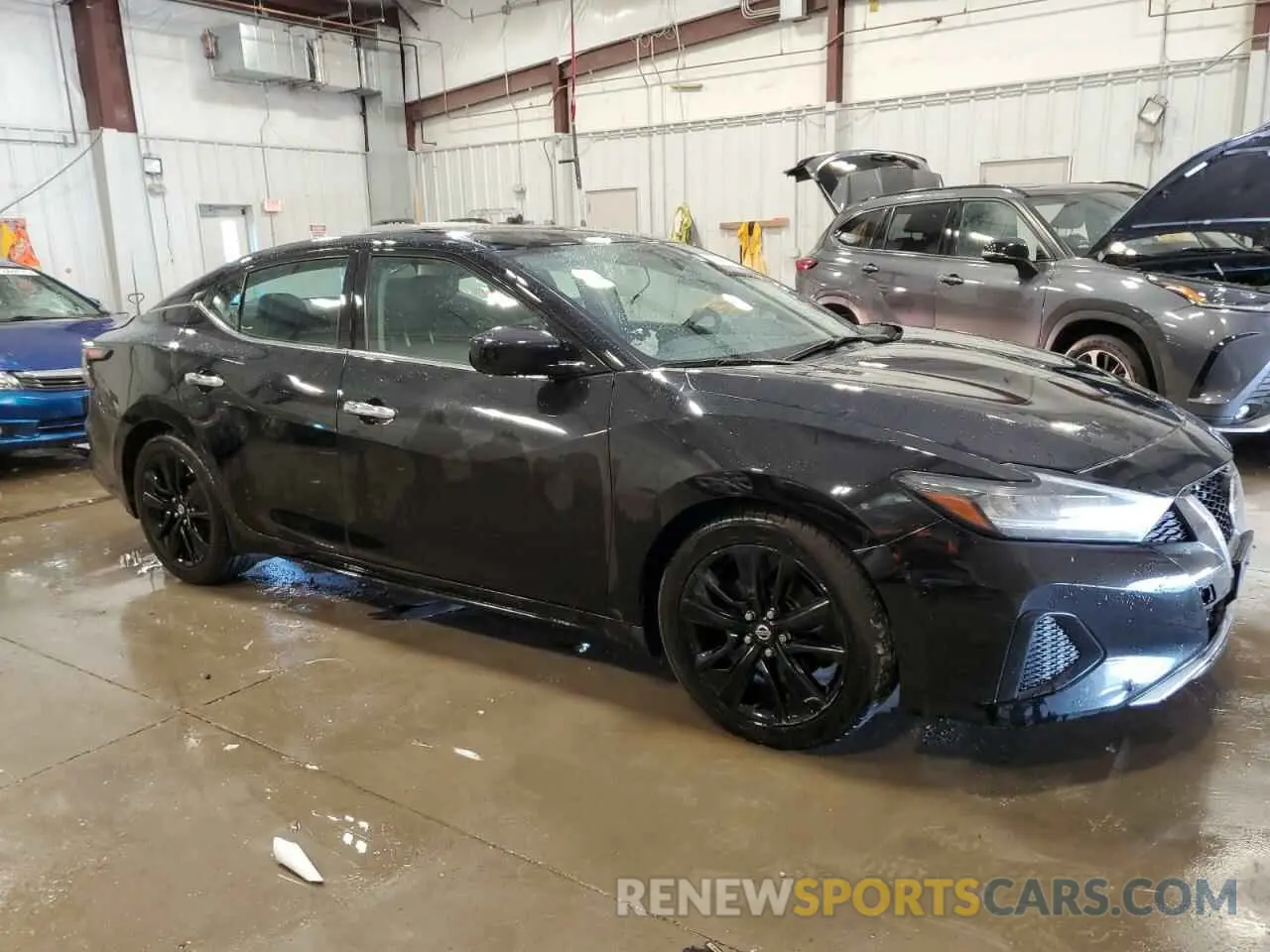 4 Photograph of a damaged car 1N4AA6AV2KC373448 NISSAN MAXIMA 2019