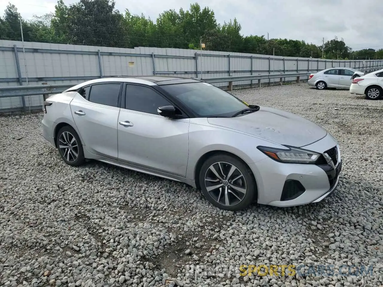 4 Photograph of a damaged car 1N4AA6AV3KC363334 NISSAN MAXIMA 2019