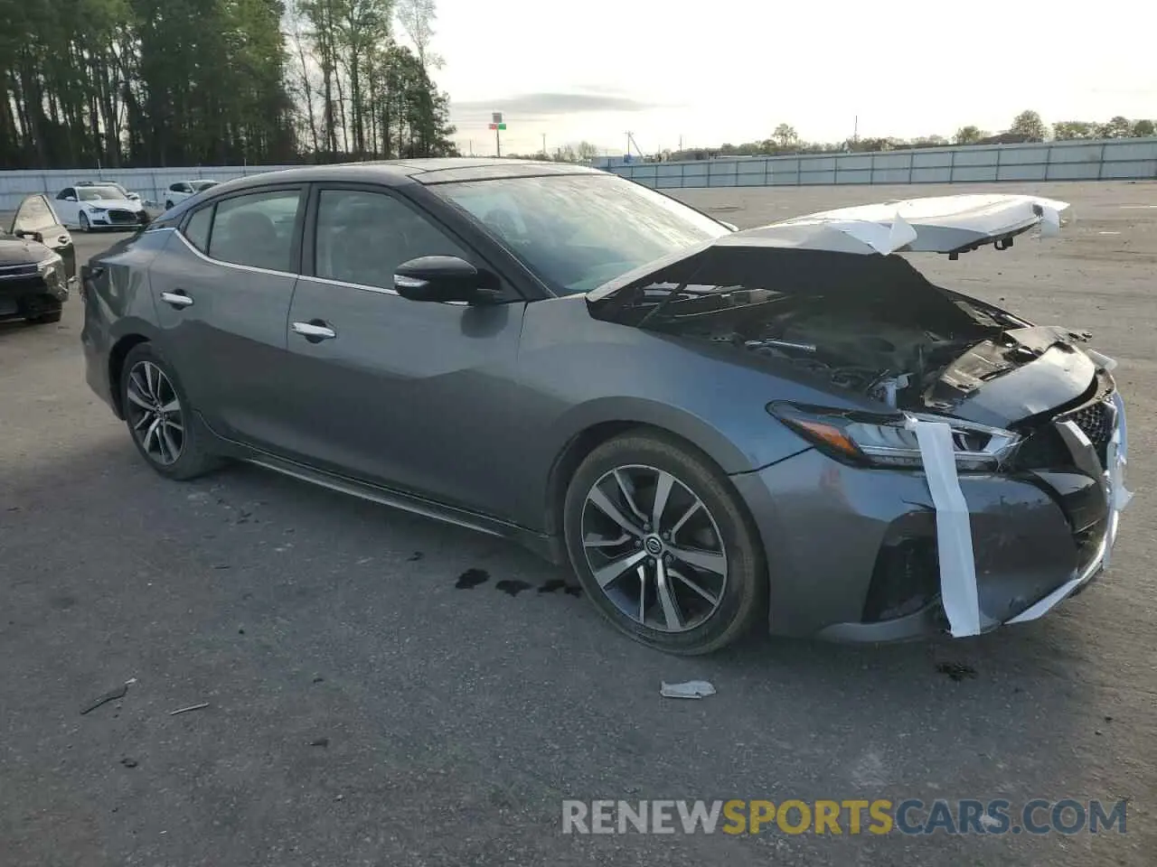 4 Photograph of a damaged car 1N4AA6AV3KC382286 NISSAN MAXIMA 2019