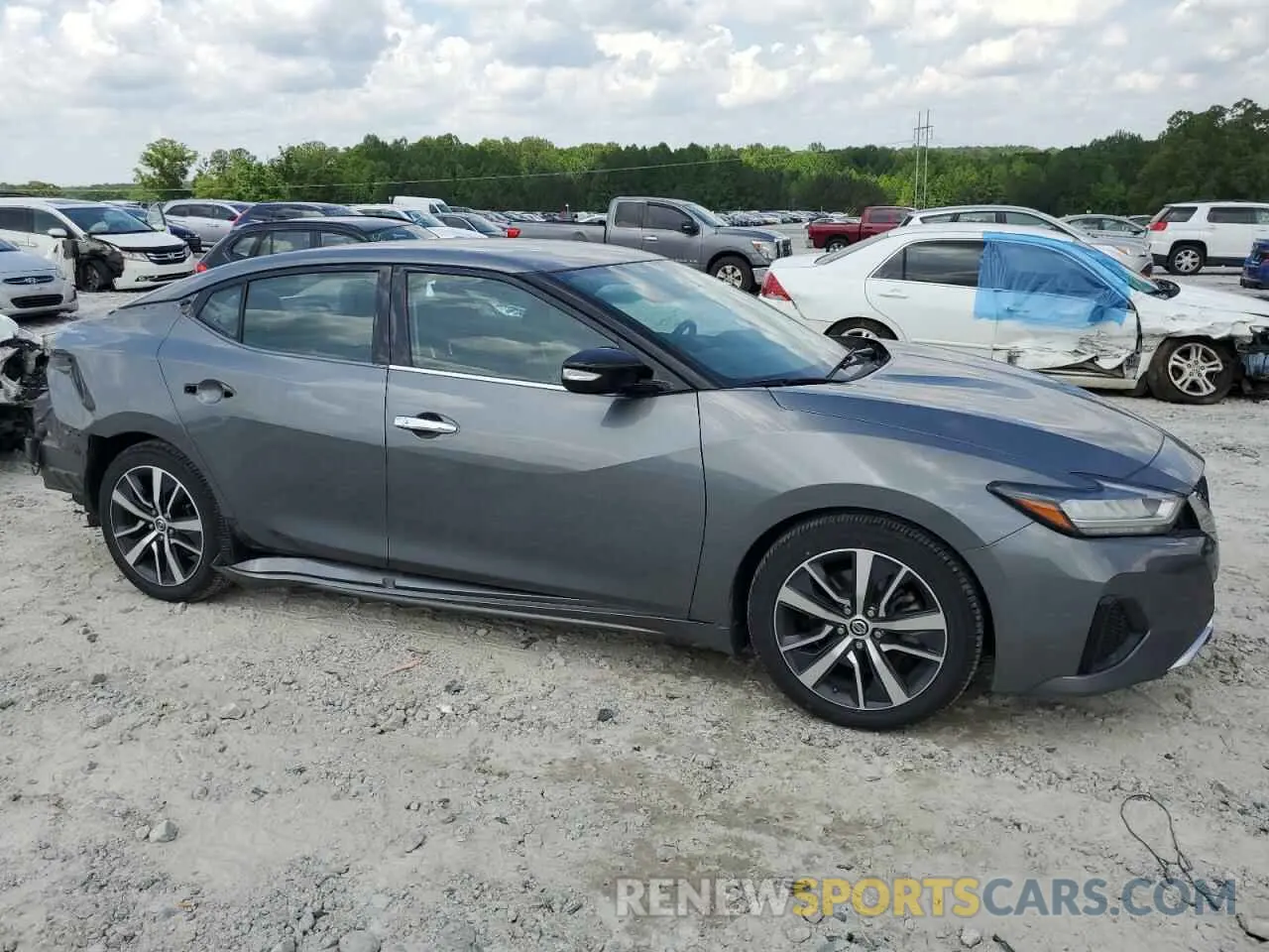 4 Photograph of a damaged car 1N4AA6AV5KC371533 NISSAN MAXIMA 2019