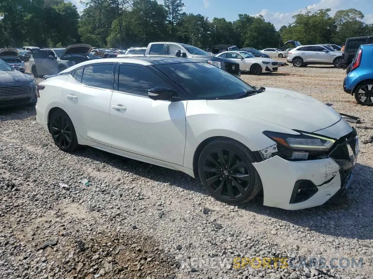 4 Photograph of a damaged car 1N4AA6AV5KC382774 NISSAN MAXIMA 2019