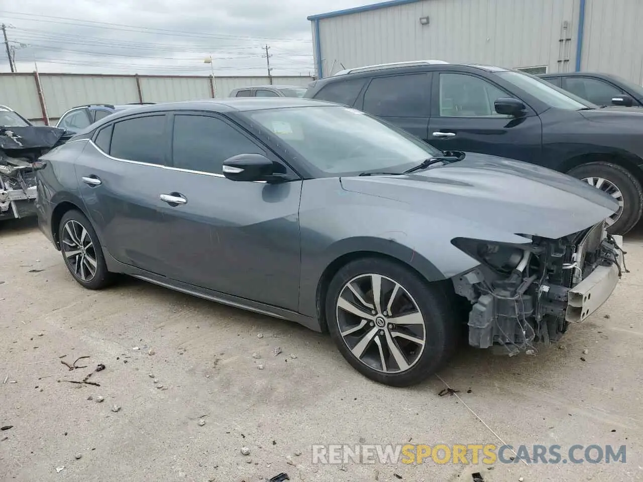 4 Photograph of a damaged car 1N4AA6AV6KC371590 NISSAN MAXIMA 2019