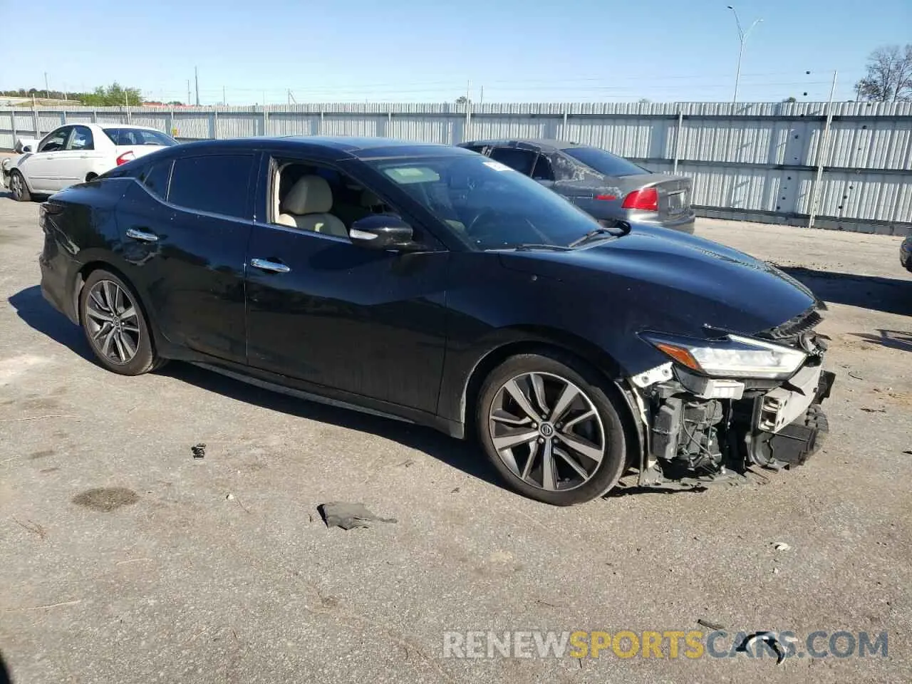 4 Photograph of a damaged car 1N4AA6AV9KC370210 NISSAN MAXIMA 2019