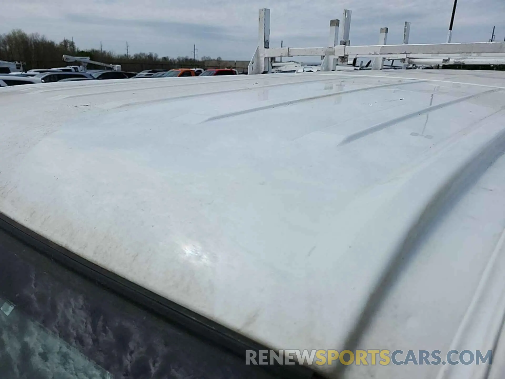 28 Photograph of a damaged car 1N6BF0KY8KN806052 NISSAN NV 2019