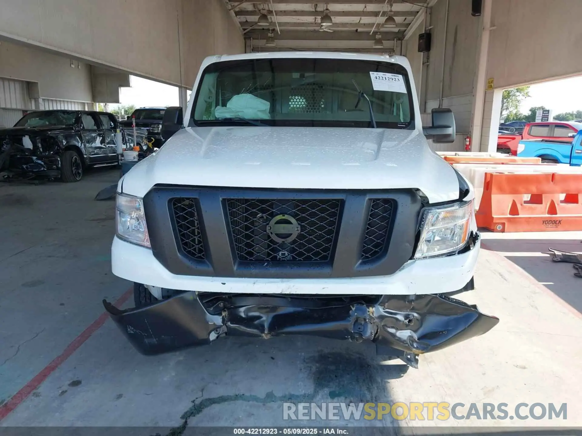 12 Photograph of a damaged car 1N6BF0KM6KN807312 NISSAN NV CARGO NV1500 2019
