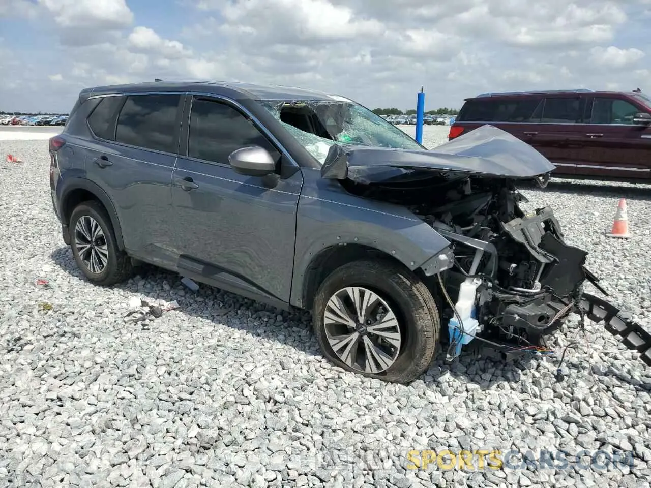 4 Photograph of a damaged car 5N1BT3BA0PC854756 NISSAN ROGUE 2023