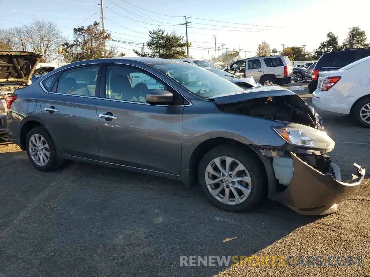 4 Photograph of a damaged car 3N1AB7AP0KY294000 NISSAN SENTRA 2019