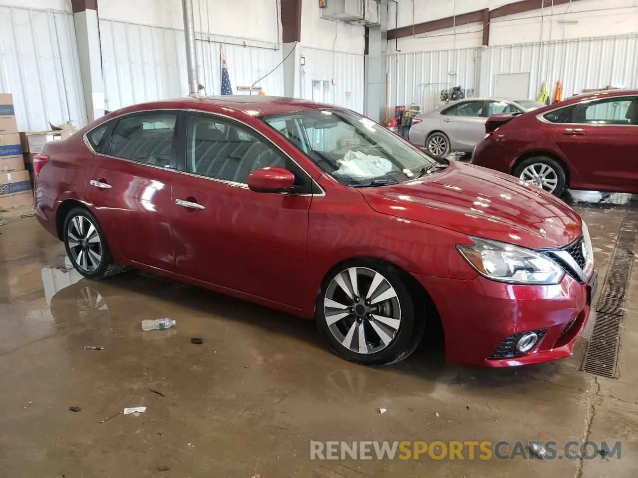 4 Photograph of a damaged car 3N1AB7AP1KY290036 NISSAN SENTRA 2019