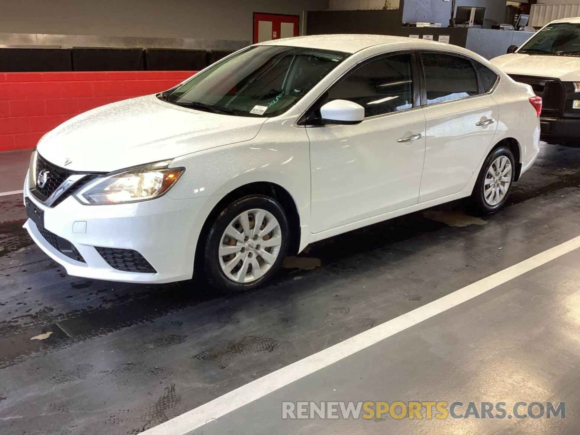 28 Photograph of a damaged car 3N1AB7AP2KY325098 NISSAN SENTRA 2019
