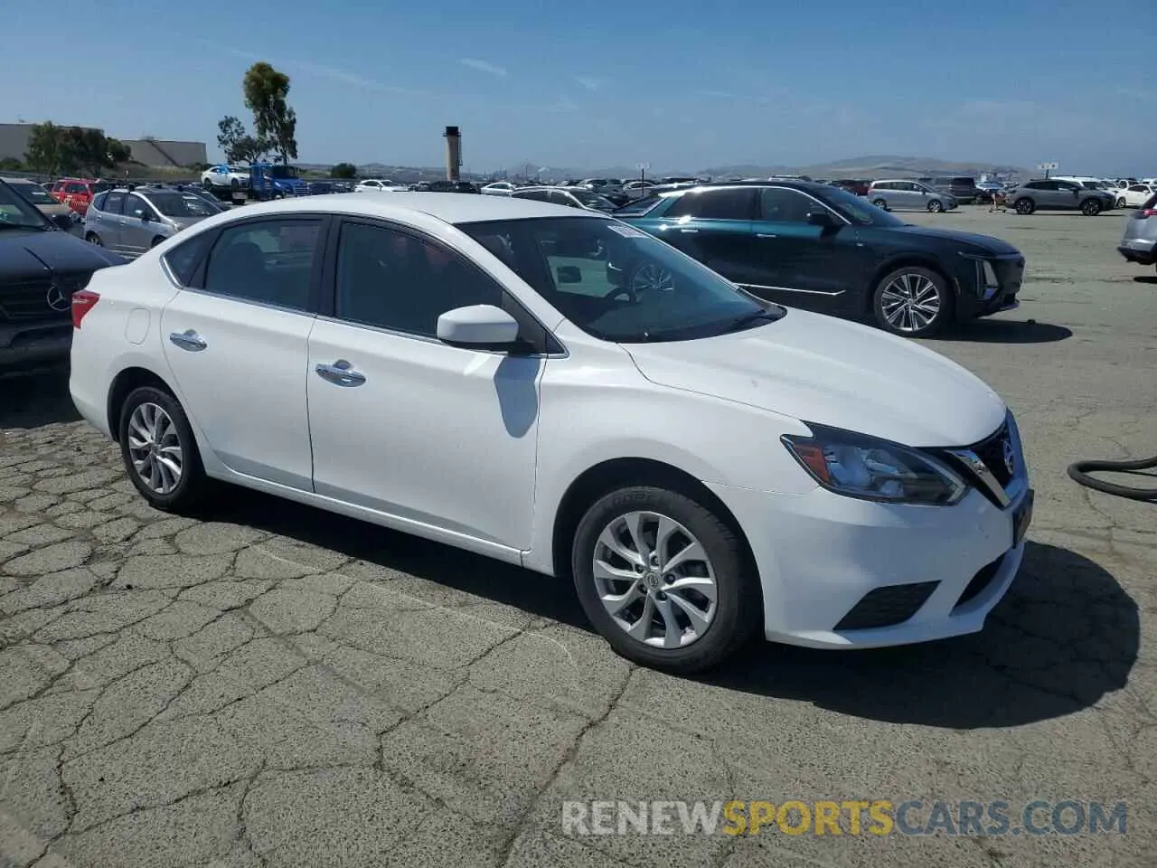 4 Photograph of a damaged car 3N1AB7AP2KY435309 NISSAN SENTRA 2019