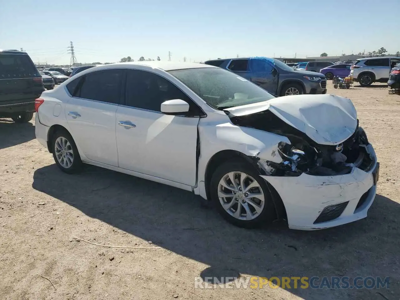 4 Photograph of a damaged car 3N1AB7AP4KL614657 NISSAN SENTRA 2019