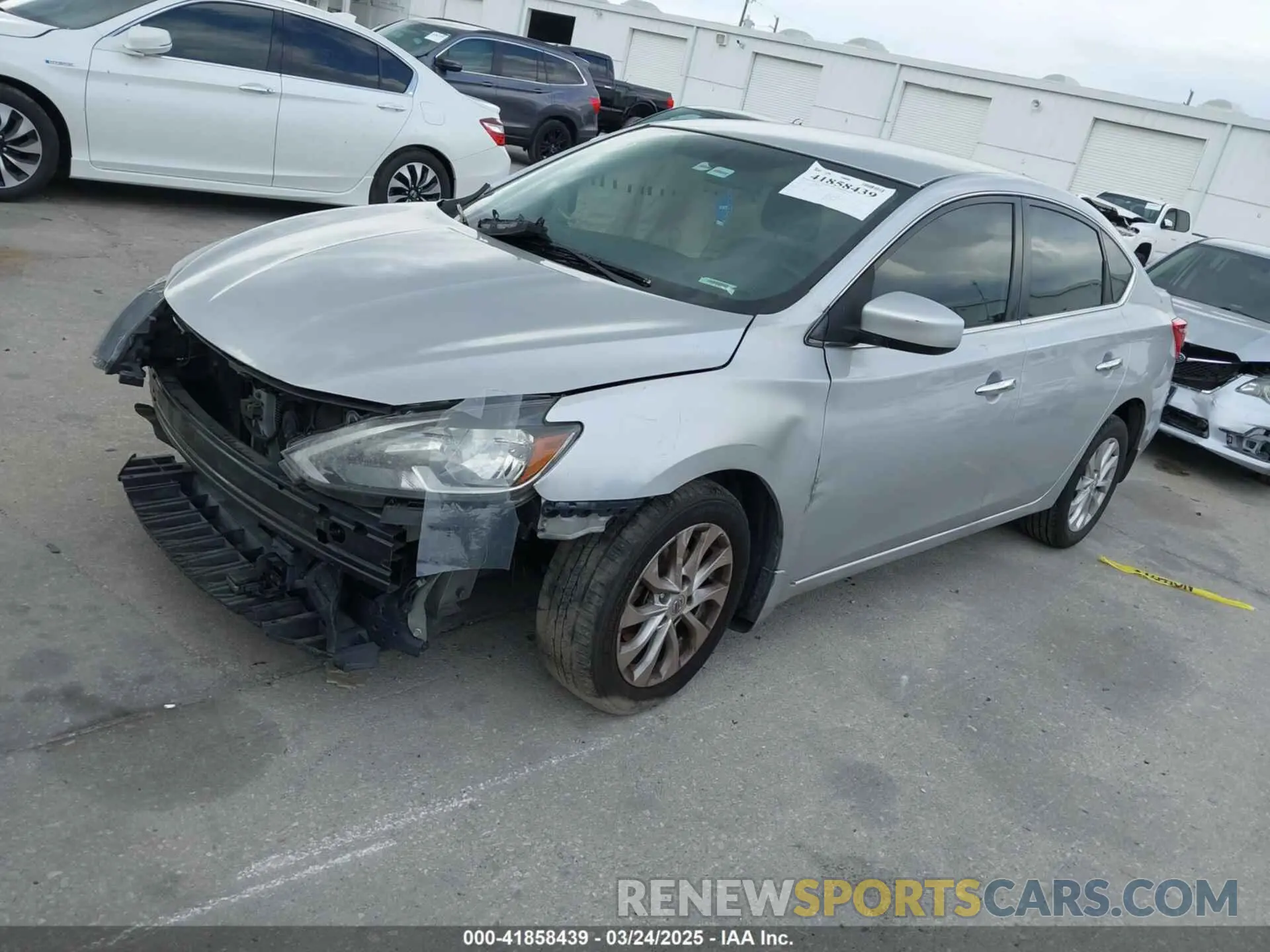 2 Photograph of a damaged car 3N1AB7AP7KY230875 NISSAN SENTRA 2019