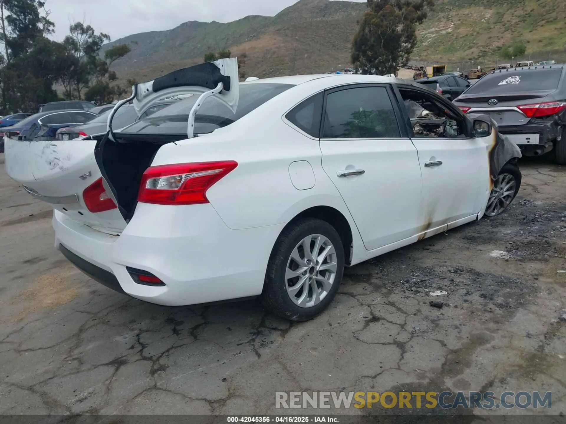 4 Photograph of a damaged car 3N1AB7AP7KY403889 NISSAN SENTRA 2019