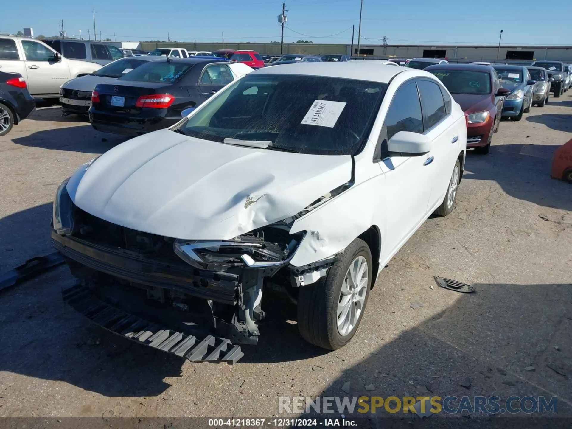 2 Photograph of a damaged car 3N1AB7AP8KY217231 NISSAN SENTRA 2019