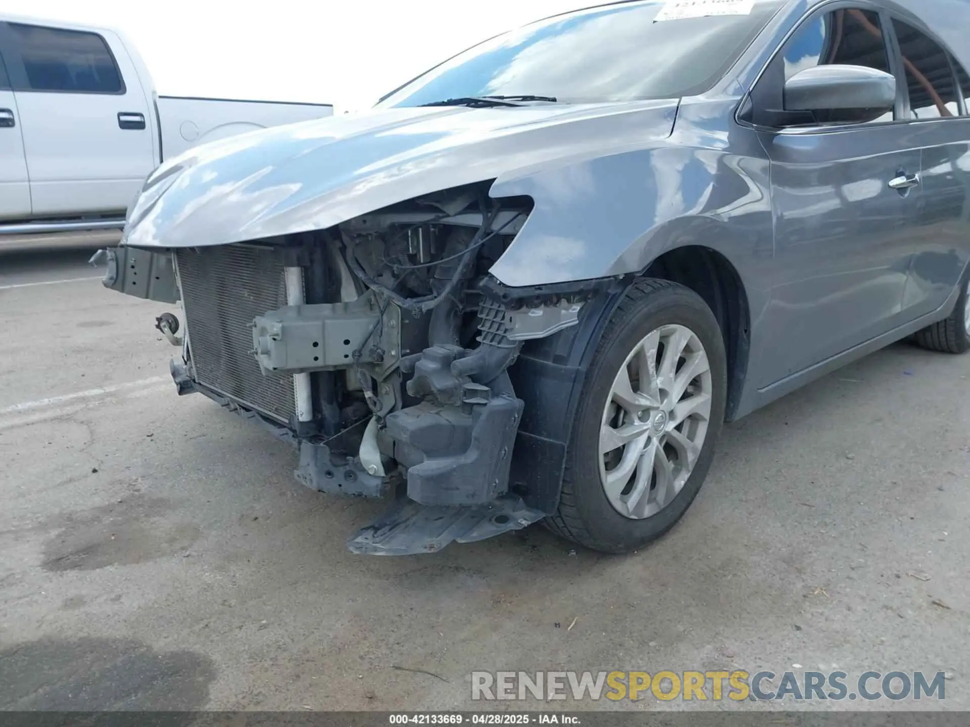 21 Photograph of a damaged car 3N1AB7AP8KY354976 NISSAN SENTRA 2019