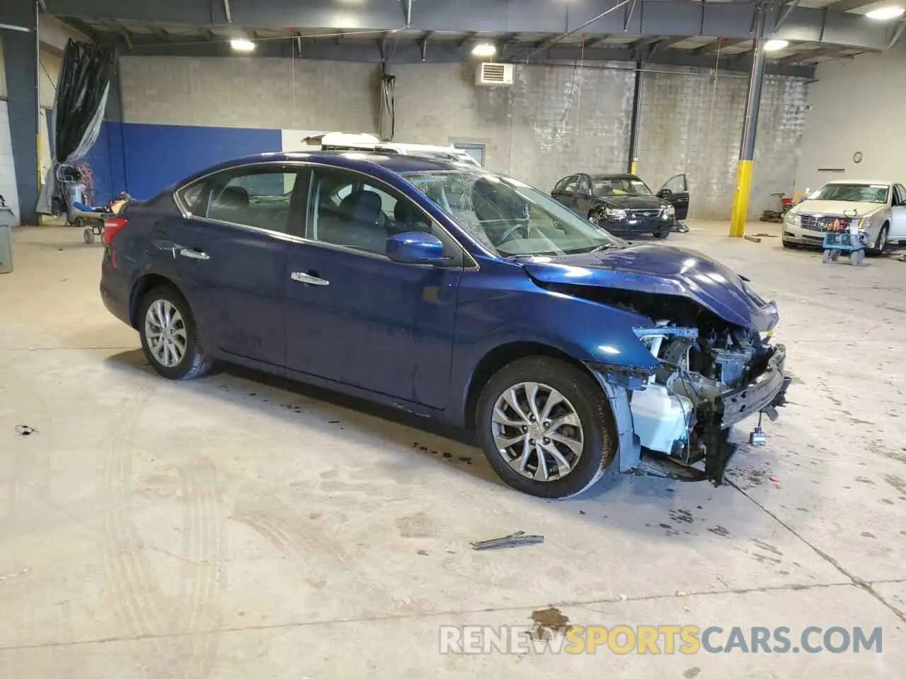 4 Photograph of a damaged car 3N1AB7AP9KY228318 NISSAN SENTRA 2019
