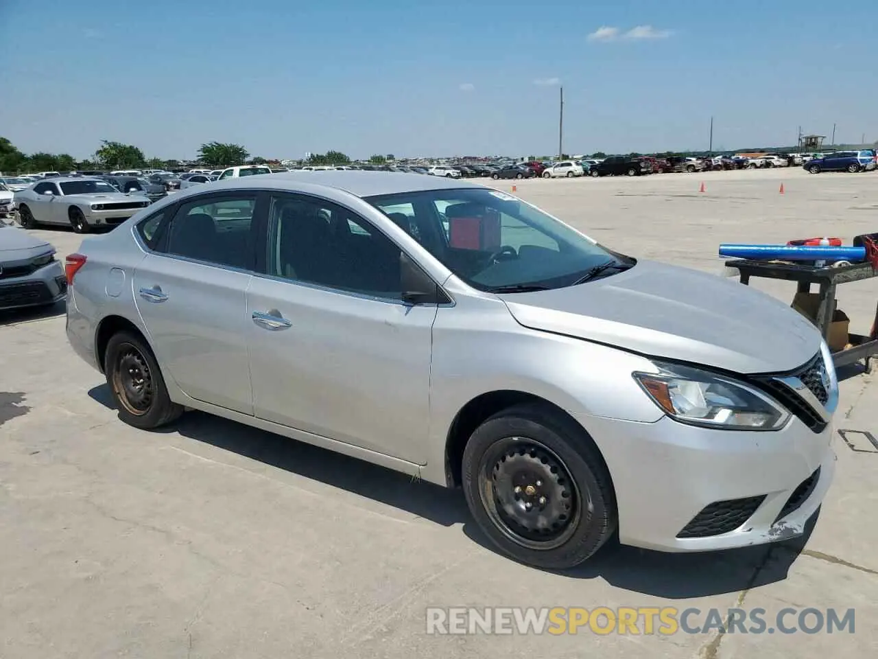 4 Photograph of a damaged car 3N1AB7AP9KY369485 NISSAN SENTRA 2019