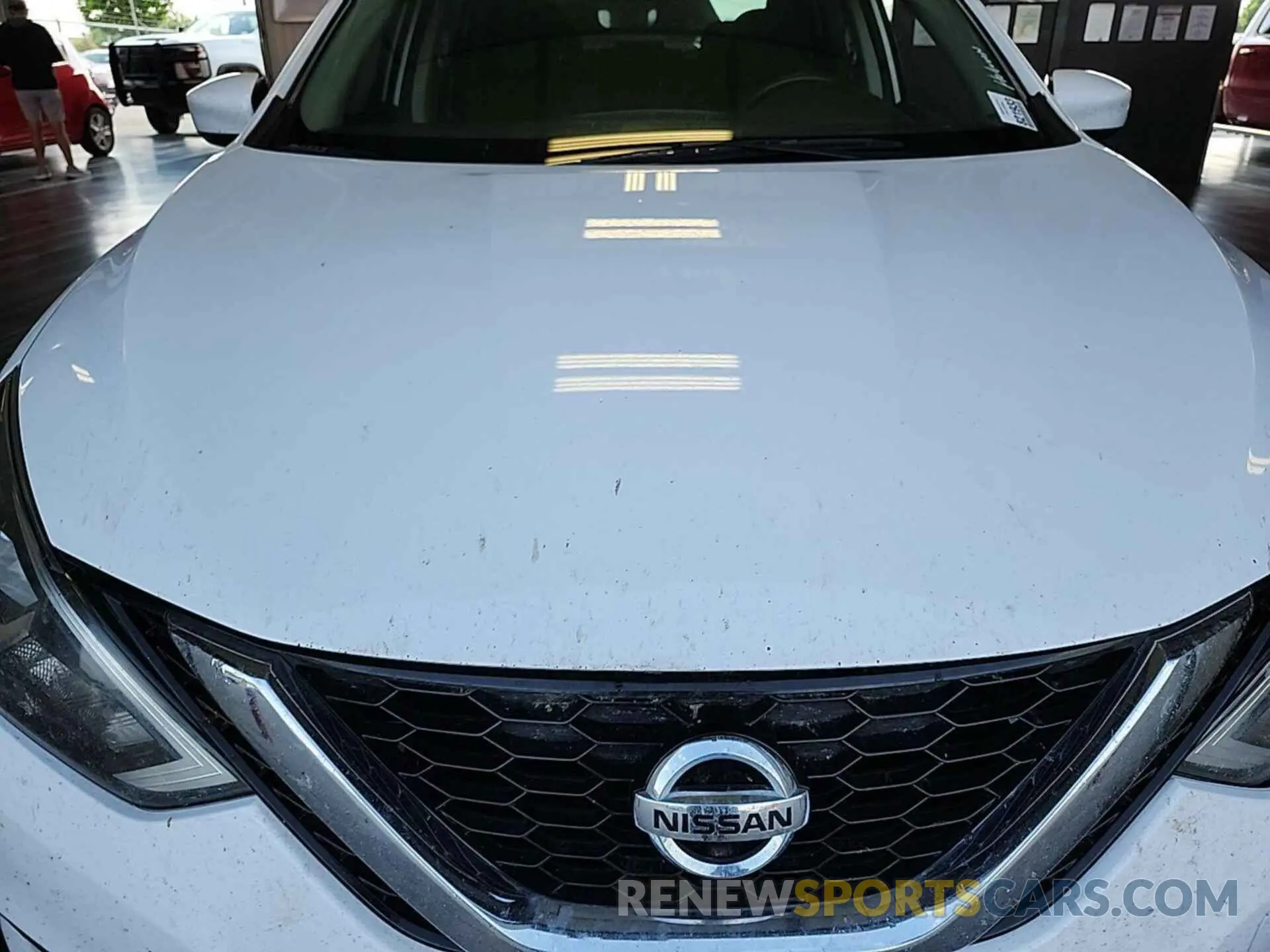 32 Photograph of a damaged car 3N1AB7AP9KY456965 NISSAN SENTRA 2019