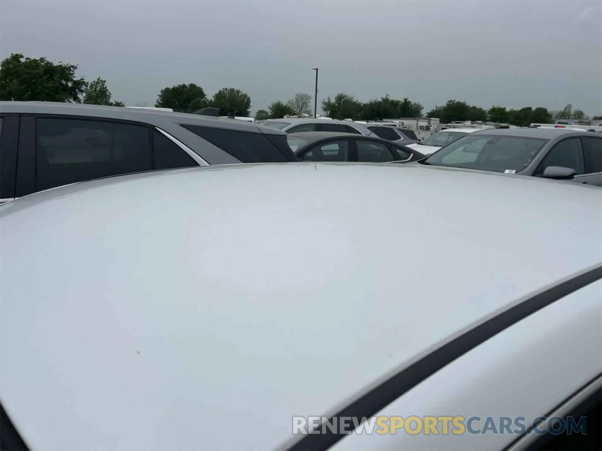 4 Photograph of a damaged car 3N1AB7APXKY211785 NISSAN SENTRA 2019
