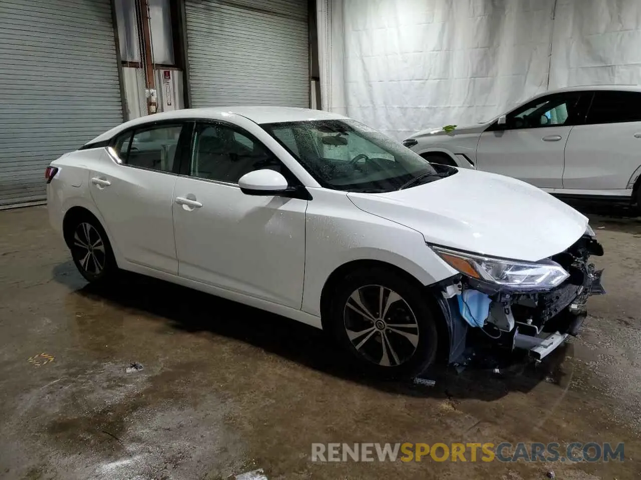 4 Photograph of a damaged car 3N1AB8CV4PY279508 NISSAN SENTRA 2023