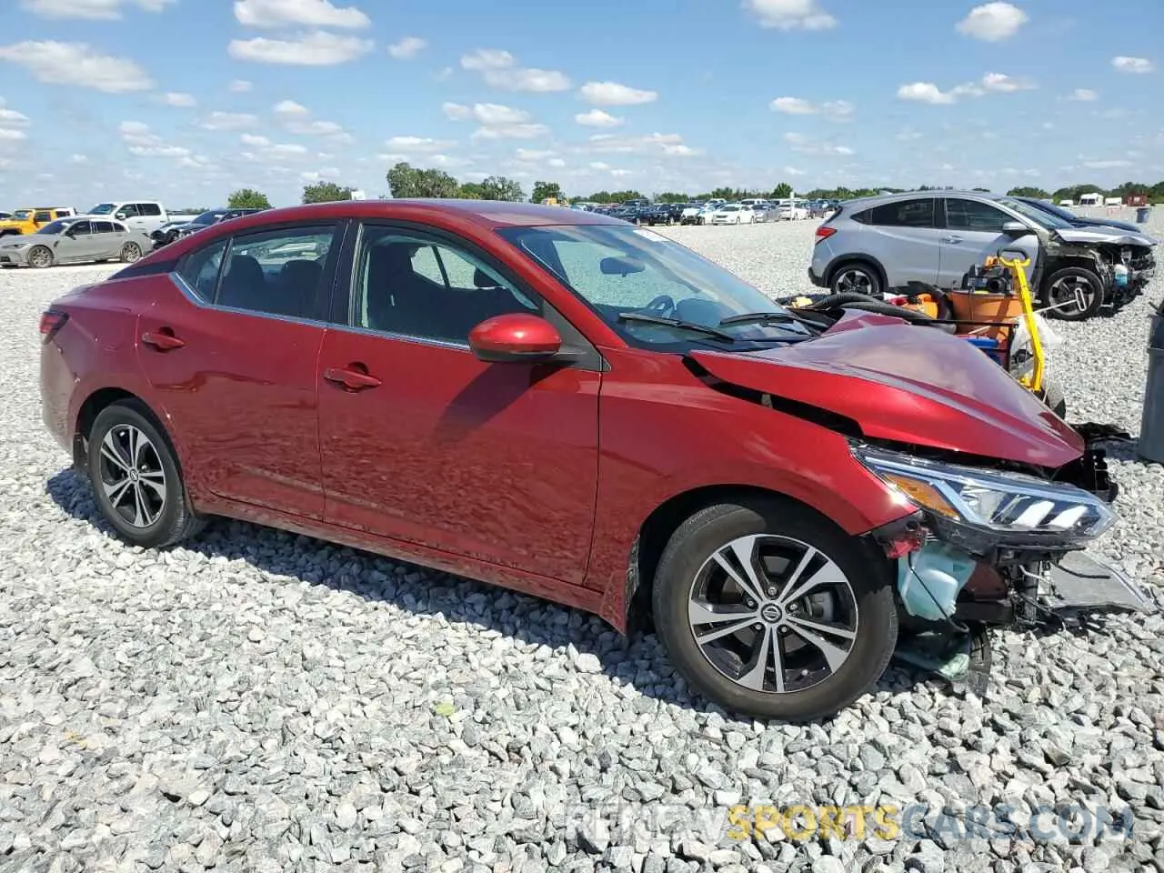 4 Photograph of a damaged car 3N1AB8CV7PY311397 NISSAN SENTRA 2023