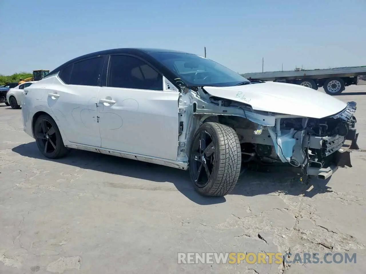 4 Photograph of a damaged car 3N1AB8DV8PY284791 NISSAN SENTRA 2023