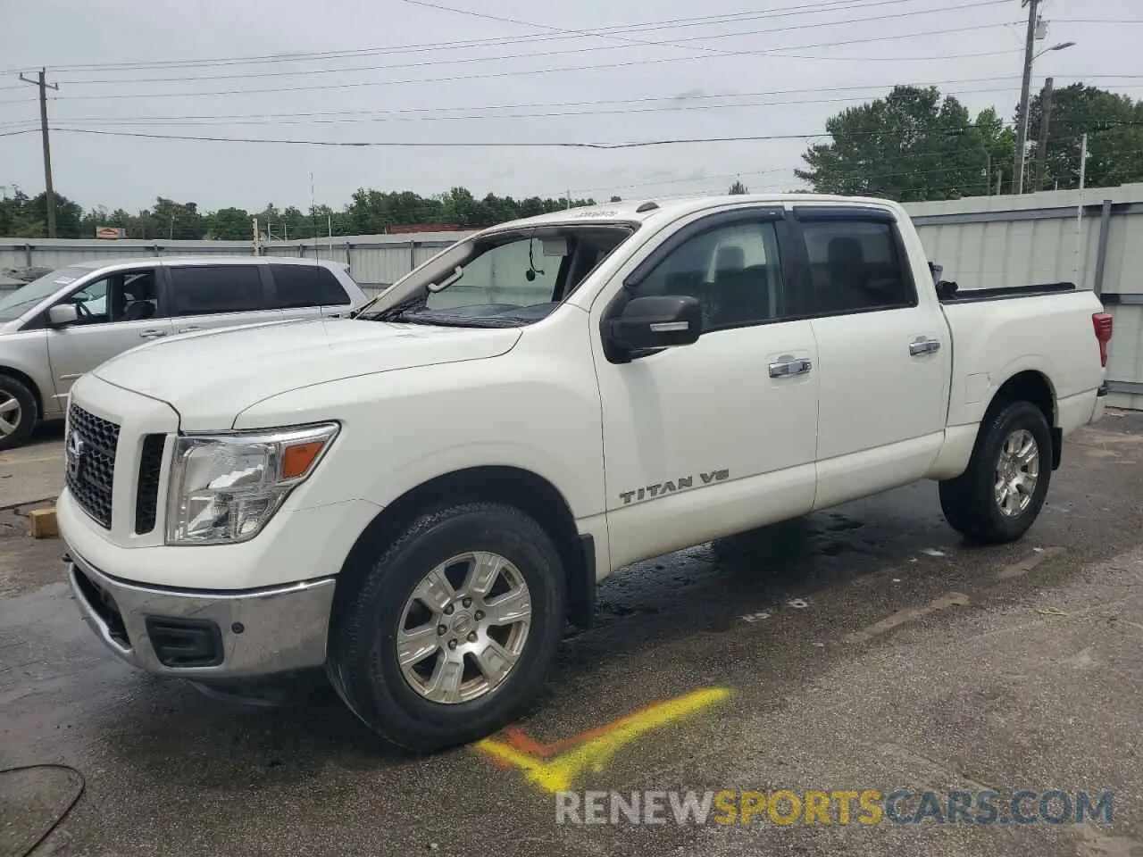1 Photograph of a damaged car 1N6AA1E50KN502974 NISSAN TITAN 2019