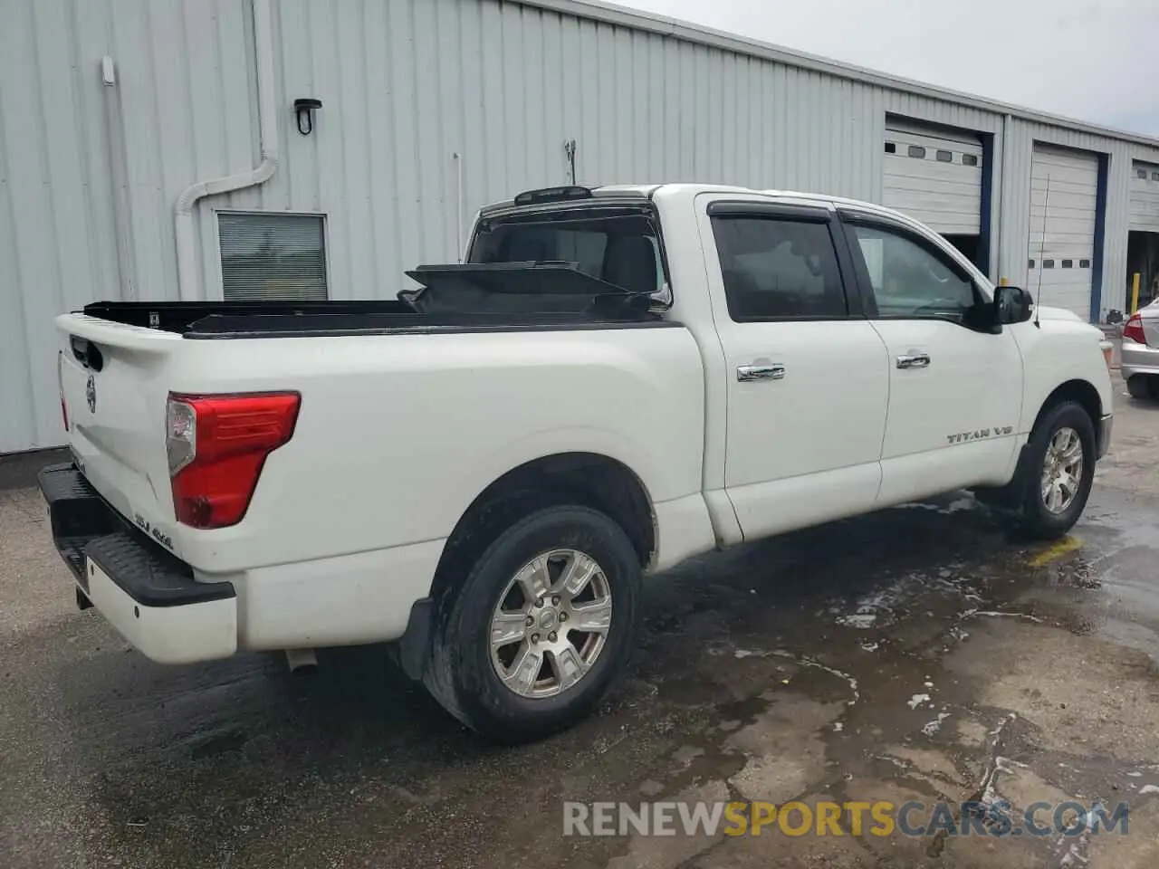 3 Photograph of a damaged car 1N6AA1E50KN502974 NISSAN TITAN 2019