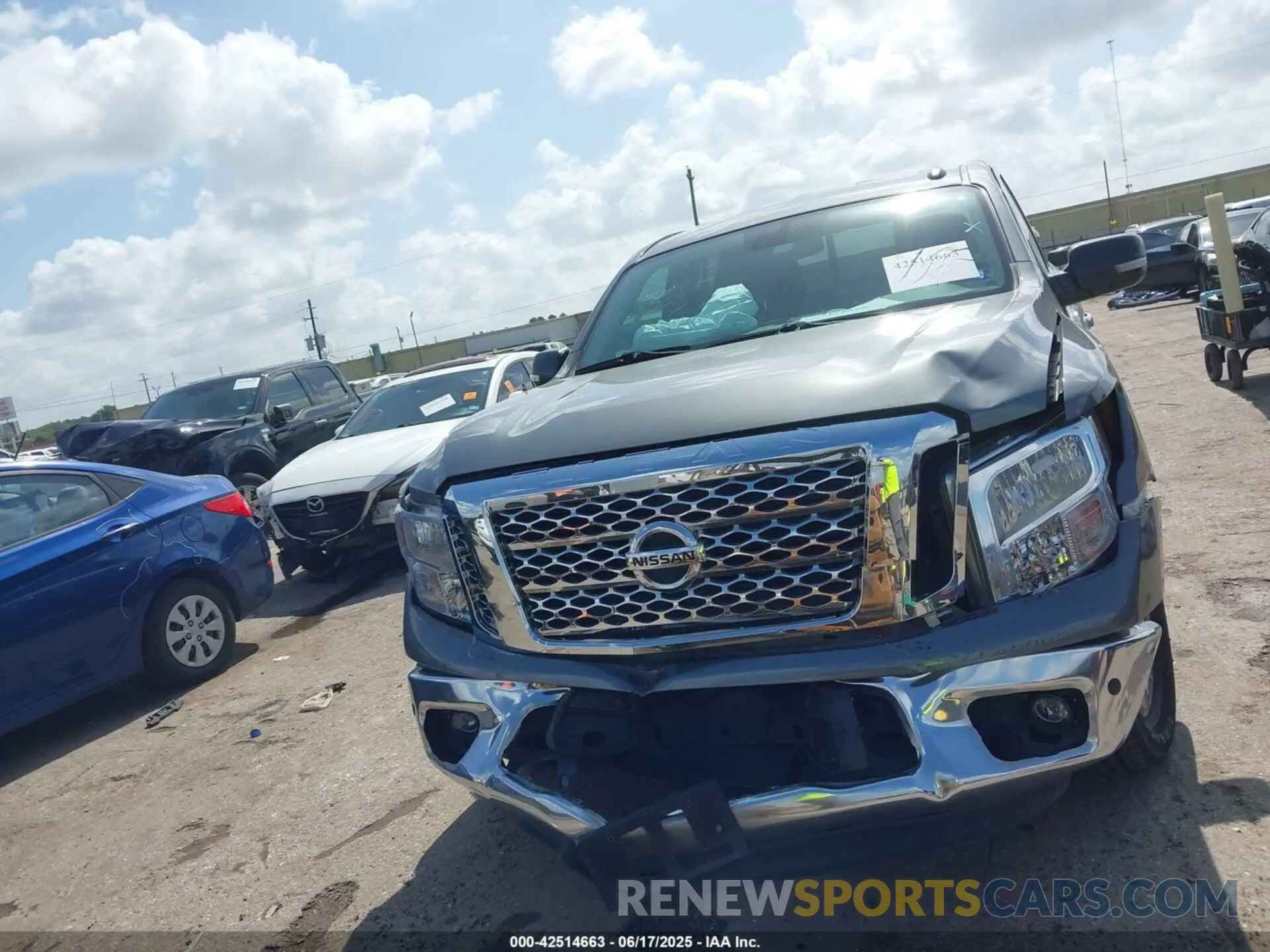 12 Photograph of a damaged car 1N6AA1E68KN525413 NISSAN TITAN 2019