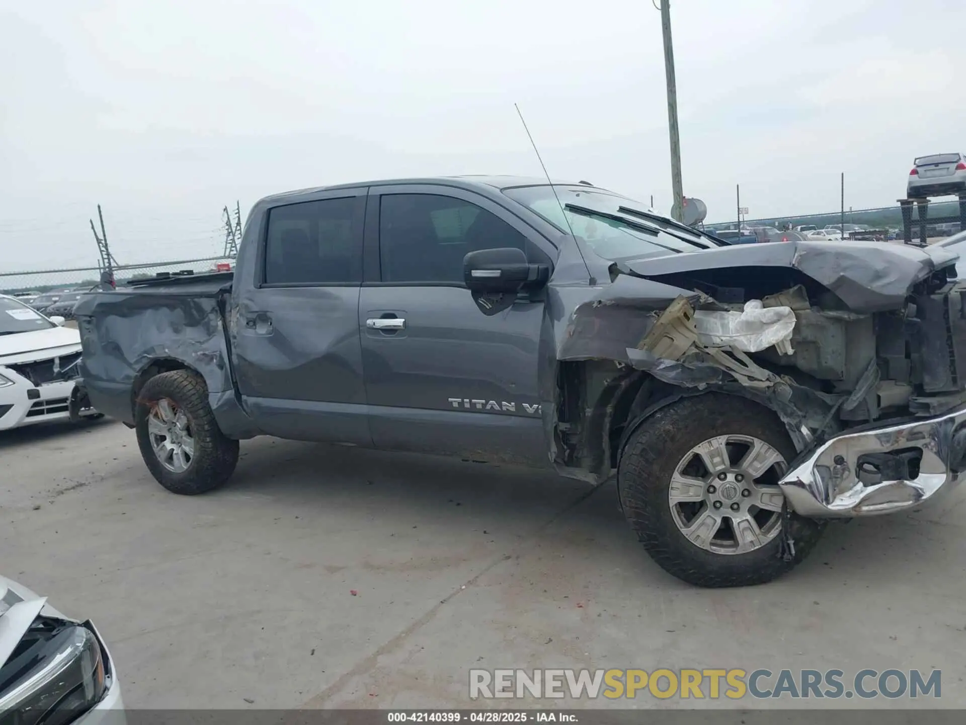 14 Photograph of a damaged car 1N6AA1E68KN528019 NISSAN TITAN 2019