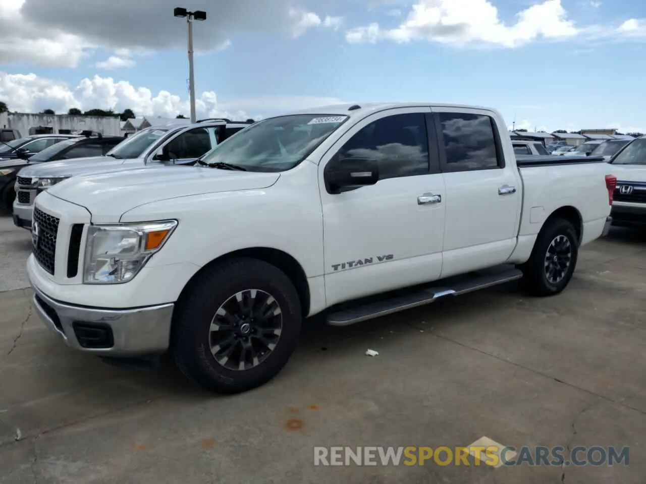 1 Photograph of a damaged car 1N6AA1EK2KN506921 NISSAN TITAN 2019