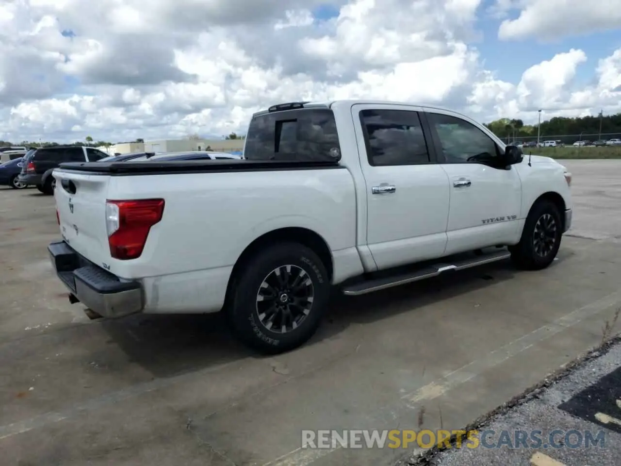 3 Photograph of a damaged car 1N6AA1EK2KN506921 NISSAN TITAN 2019