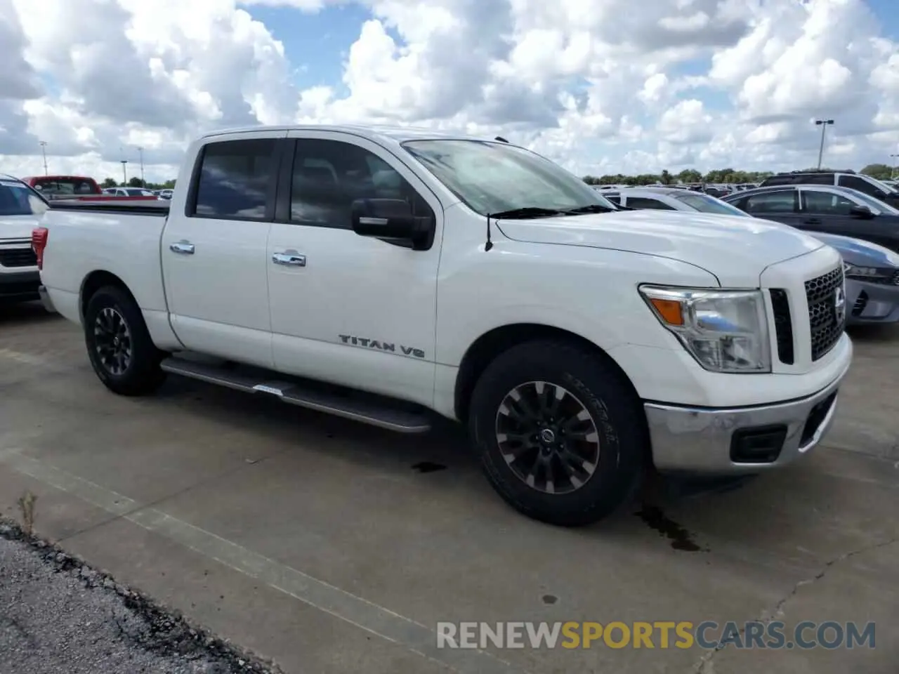 4 Photograph of a damaged car 1N6AA1EK2KN506921 NISSAN TITAN 2019