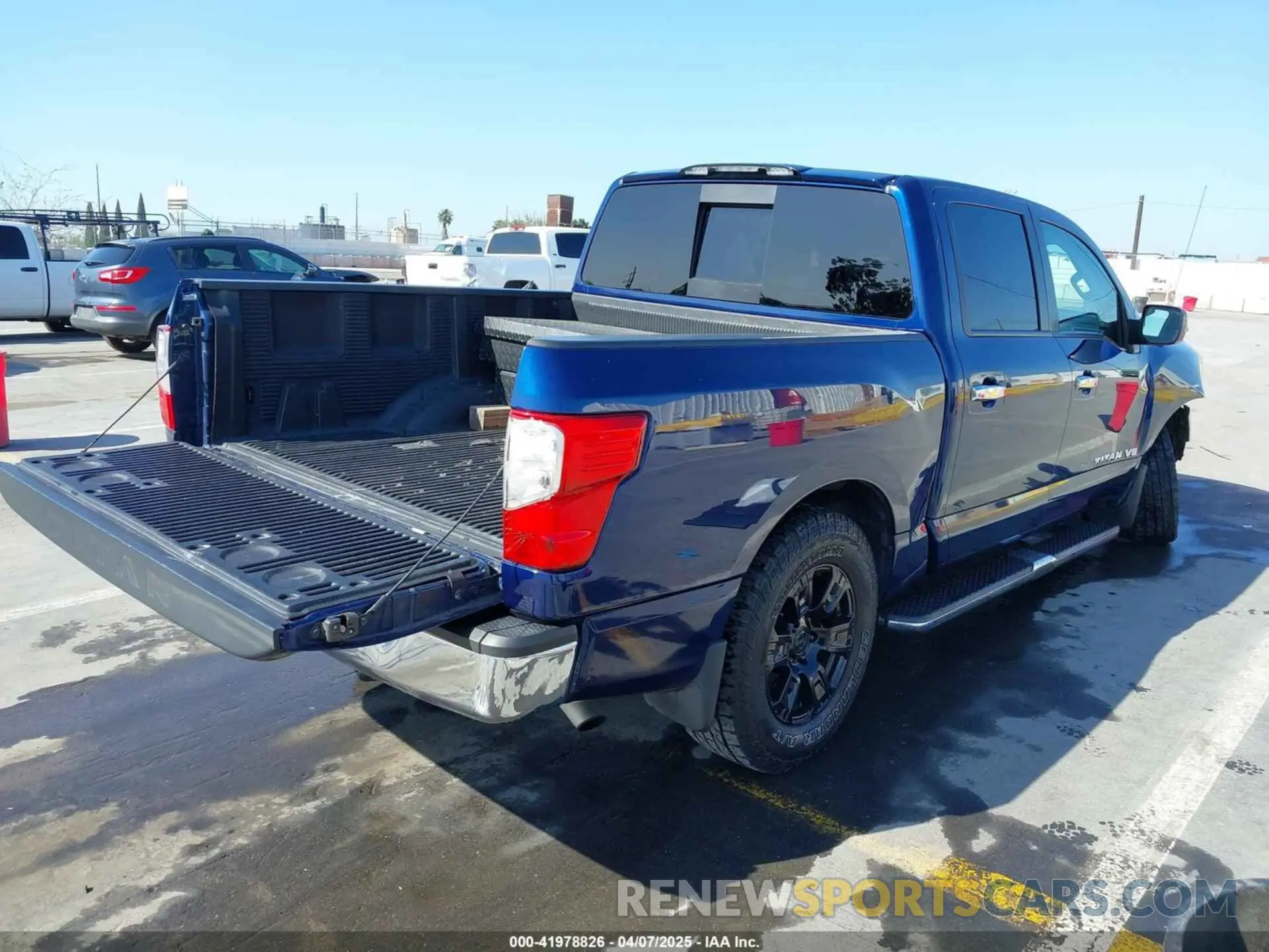 4 Photograph of a damaged car 1N6AA1EK4KN500599 NISSAN TITAN 2019
