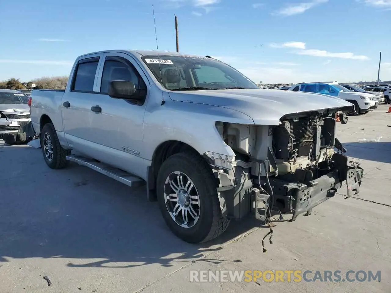 4 Photograph of a damaged car 1N6AA1EK9KN513610 NISSAN TITAN 2019