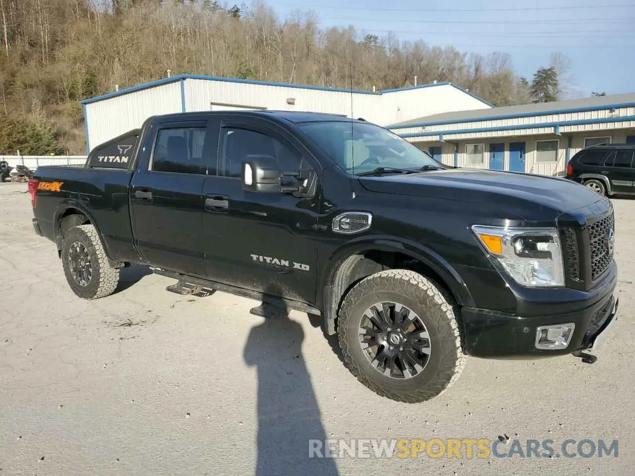 4 Photograph of a damaged car 1N6BA1F44KN530464 NISSAN TITAN 2019