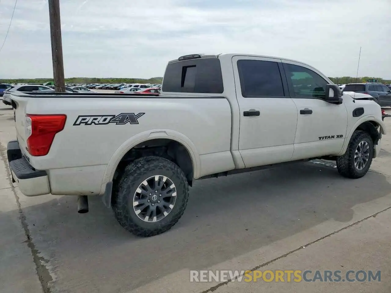 3 Photograph of a damaged car 1N6BA1F4XKN524460 NISSAN TITAN 2019
