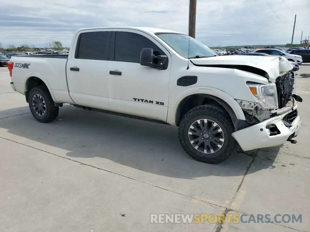 4 Photograph of a damaged car 1N6BA1F4XKN524460 NISSAN TITAN 2019