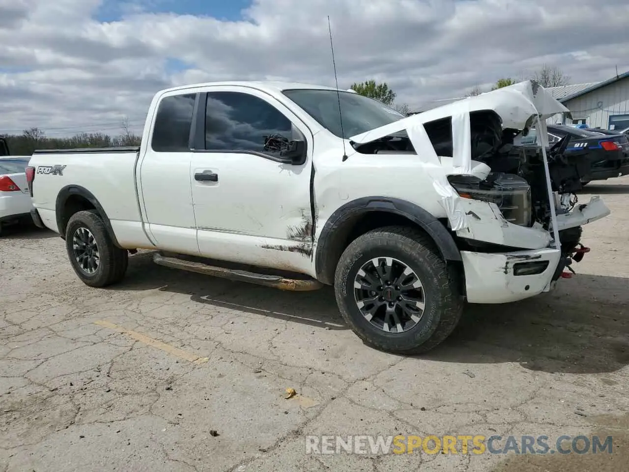4 Photograph of a damaged car 1N6AA1CD6LN512081 NISSAN TITAN 2020