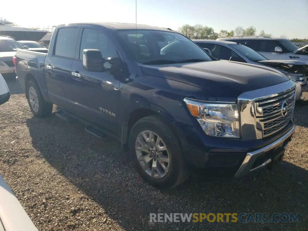 4 Photograph of a damaged car 1N6AA1EF0MN512559 NISSAN TITAN 2021